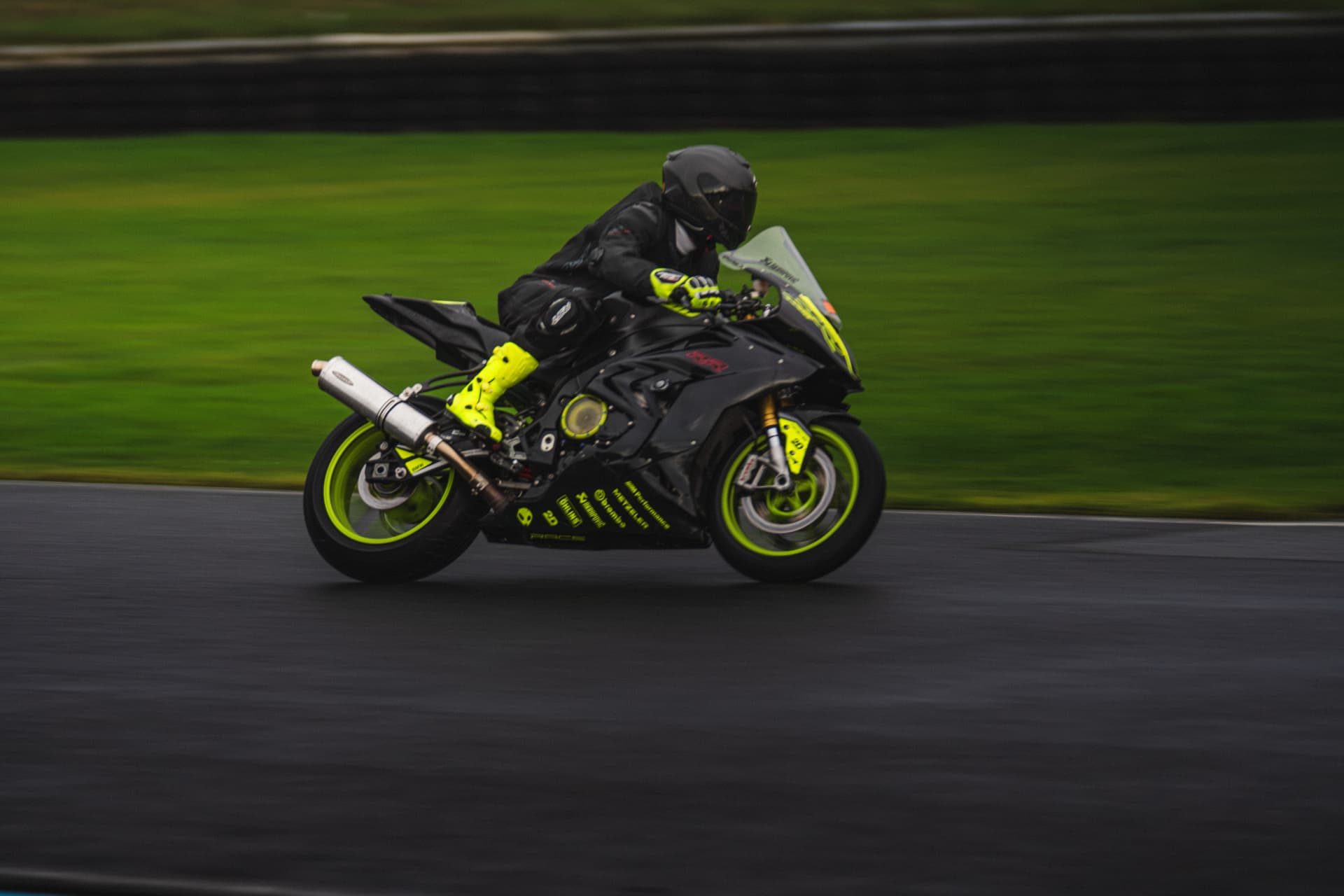 Knee Down: Cornering in the Rain — example photograph.